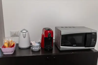 Cucina o angolo cottura di Appartamento Etna & Catania intimo comodo max 4 persone