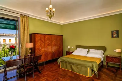 Letto o letti in una camera di B&B Villa Maria