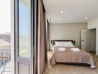 Letto o letti in una camera di B&B Don Diego Pedara