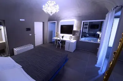 Letto o letti in una camera di Etna Suite Group