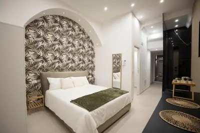 Letto o letti in una camera di Cinere Rooms
