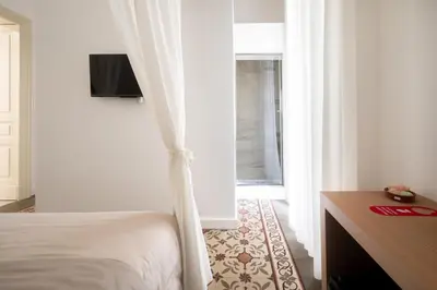 Letto o letti in una camera di Catammari