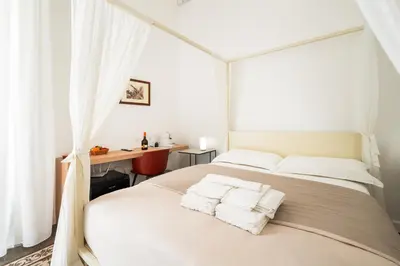 Letto o letti in una camera di Catammari