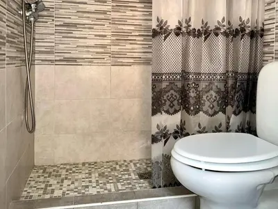 Bagno di EnjoyCasa Tra Sole Mare e L'Etna