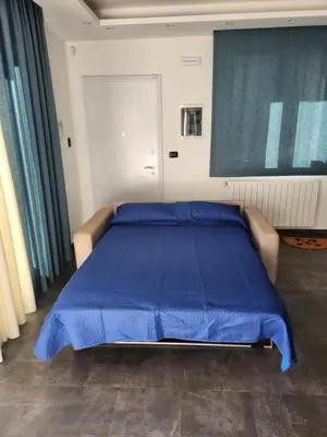 Letto o letti in una camera di Villa Luigi