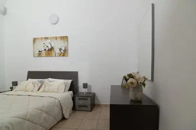 Letto o letti in una camera di Dimora Saracena