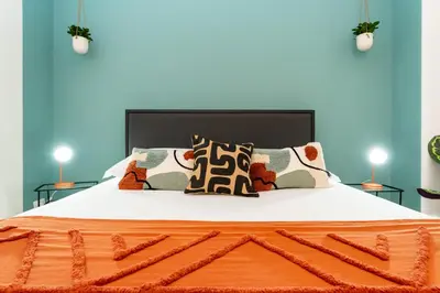 Letto o letti in una camera di Bohemien House Catania by Harmony House