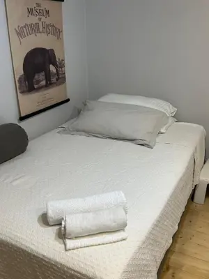 Letto o letti in una camera di Moon House
