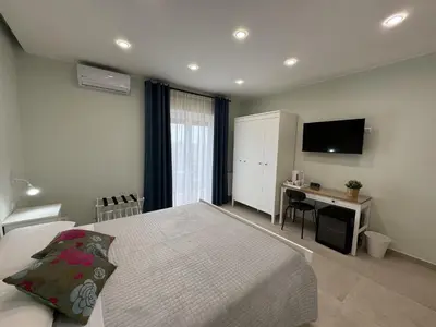Letto o letti in una camera di B&B Milicia