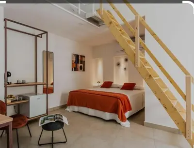 Letto o letti in una camera di sikelia rooms