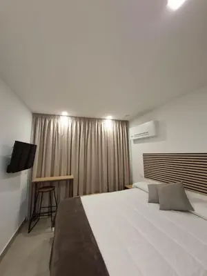 Letto o letti in una camera di sikelia rooms