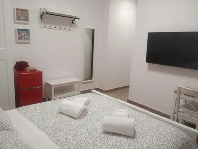 Letto o letti in una camera di Live & Love Catania