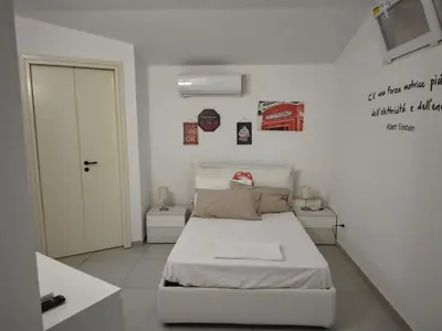 Letto o letti in una camera di Dimora delle Palme Scogliera
