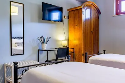 Letto o letti in una camera di Open Horizon - Short Rent