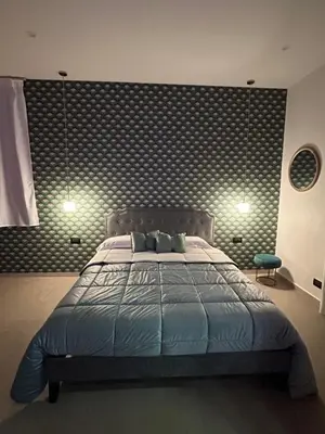 Letto o letti in una camera di EtnaLux