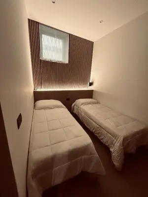 Letto o letti in una camera di EtnaLux