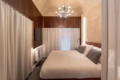 Letto o letti in una camera di Áita Suite