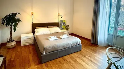 Letto o letti in una camera di To Do Sicily Home