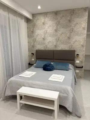 Letto o letti in una camera di Camastra house