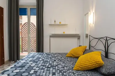 Letto o letti in una camera di Casa Ambasciatori