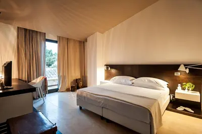 Letto o letti in una camera di Ramo d'Aria Etna Boutique Hotel