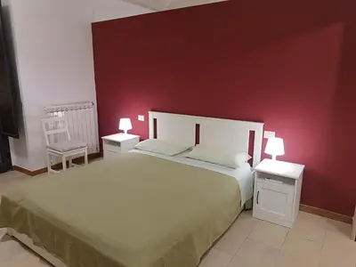 Letto o letti in una camera di Terrazze Bella Epoque