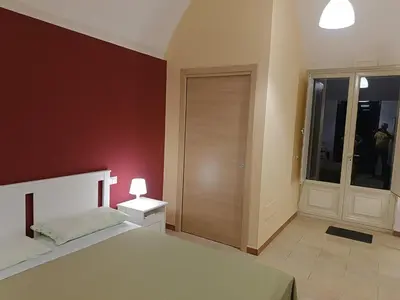 Letto o letti in una camera di Terrazze Bella Epoque