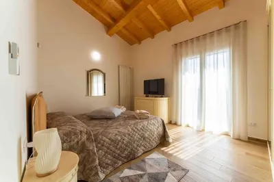 Letto o letti in una camera di Villa Graziella