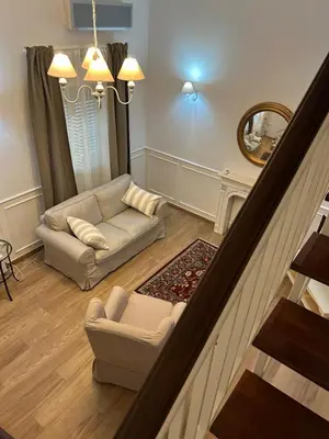 Area soggiorno di Charming Beachfront Retreat
