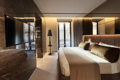 Letto o letti in una camera di Donna Filomena Luxury Suites