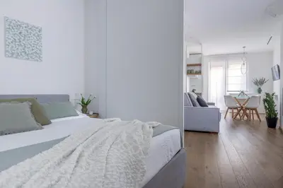 Letto o letti in una camera di Acacie Apt