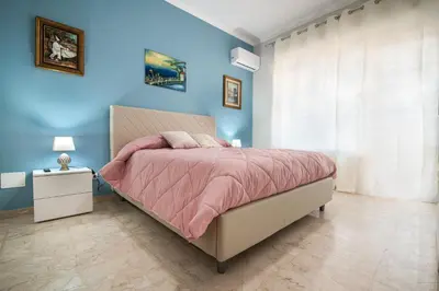 Letto o letti in una camera di StesicoROOM