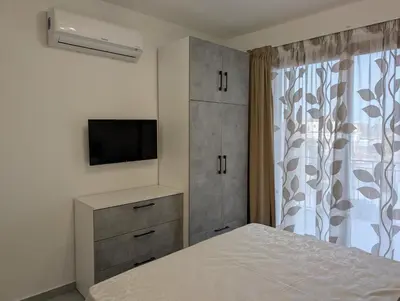 Letto o letti in una camera di Infinity House Catania