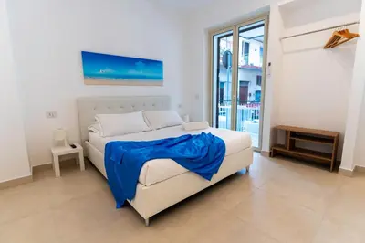 Letto o letti in una camera di Faraglioni House