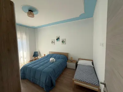 Letto o letti in una camera di Heroes Apartments