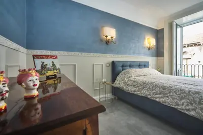 Letto o letti in una camera di Etna Agathae Suite