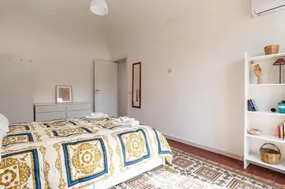 Letto o letti in una camera di GuestHost - La Terrazza di Turi