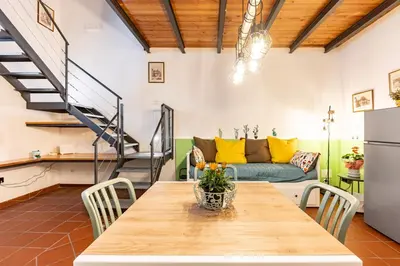 Area soggiorno di GuestHost - Le Ciminiere Home - Central apt near the station