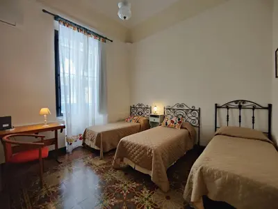 Letto o letti in una camera di La casa di Lia