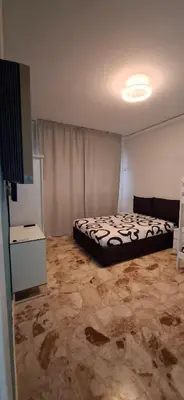 Letto o letti in una camera di Damablu