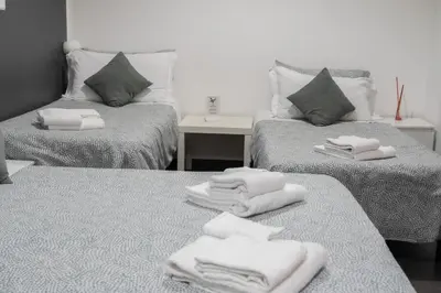Letto o letti in una camera di B&B Verga