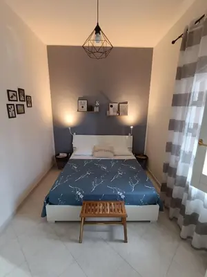 Letto o letti in una camera di Mama Etna