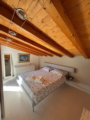 Letto o letti in una camera di Paola guest house