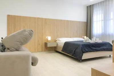 Letto o letti in una camera di Suite del Corso Sicilia