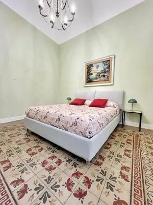Letto o letti in una camera di U lettu da zita Acitrezza