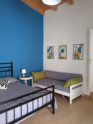 Letto o letti in una camera di Du Home