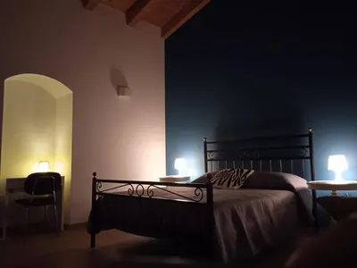 Letto o letti in una camera di Du Home