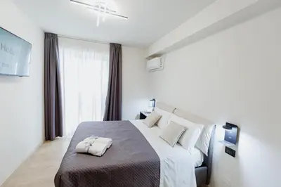 Letto o letti in una camera di Mazzini Apartments Sikania