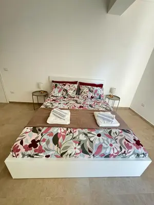 Letto o letti in una camera di LuCa's Apartament