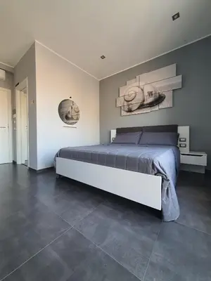 Letto o letti in una camera di Luca's Garden B&B in Catania